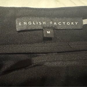 English Factory Elegant Black skort. Zipper on wide. Worn once.
